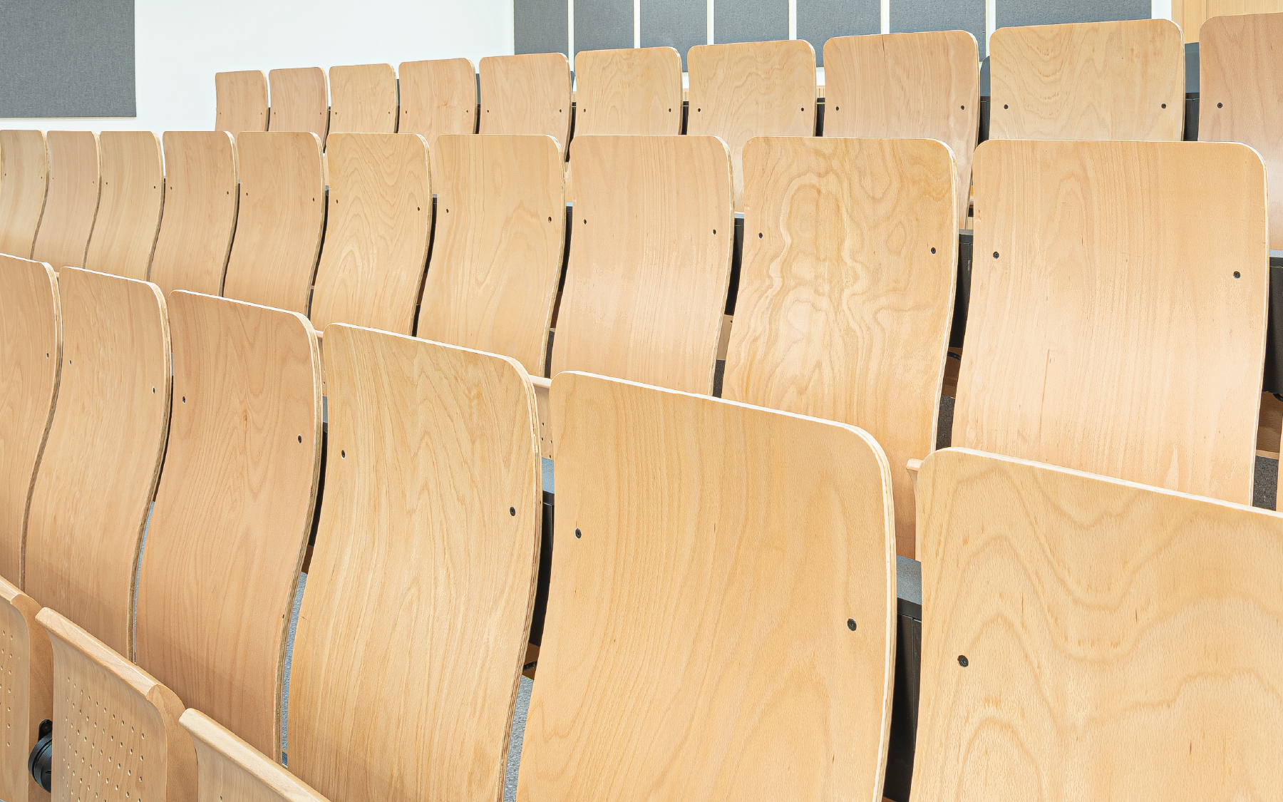 RPB Education & Public's design, with its refined S-curve, luxurious cold-molded PU cushion, and smart hidden writing tablet system, symbolizes the combination of knowledge, functionality, and international-class aesthetics.