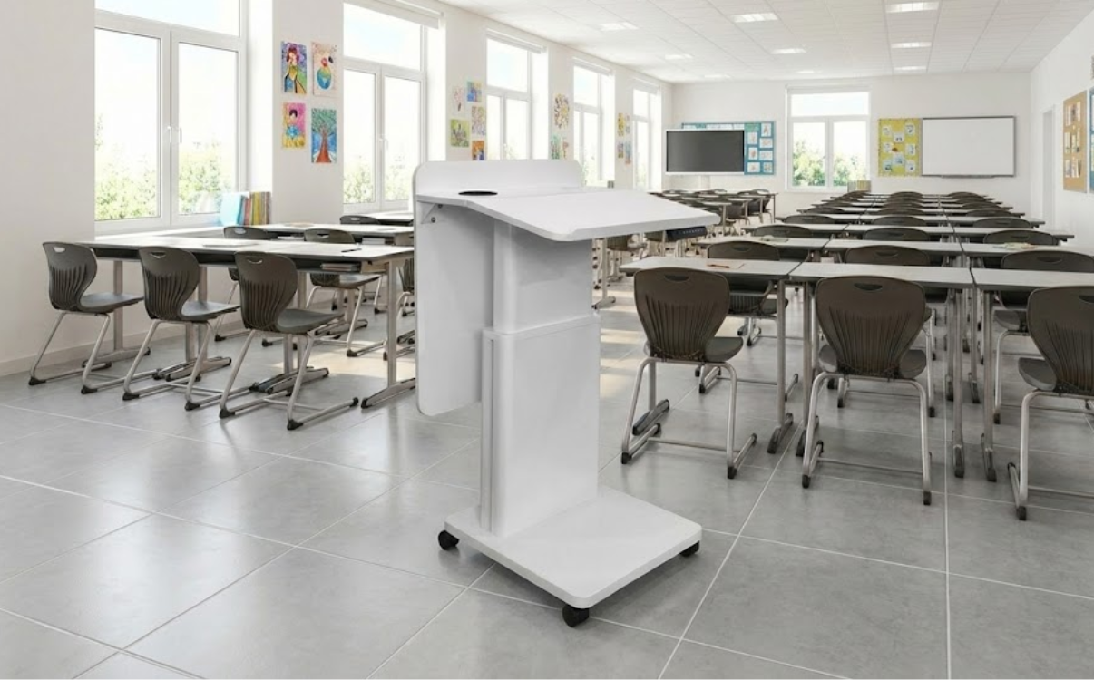 Bàn giáo viên và bục nâng hạ Edulift 02 trong lớp học hiện đại, thiết kế tinh gọn và phù hợp môi trường sư phạm.